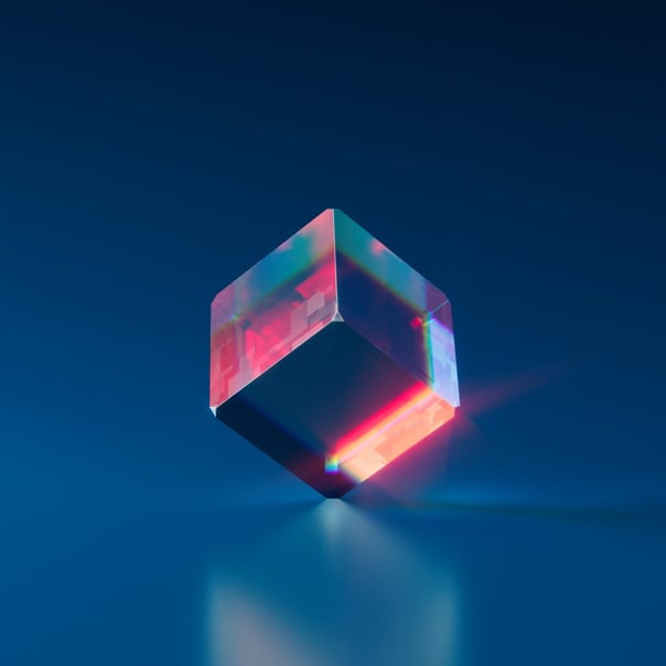 transparent die on its edge with blue background